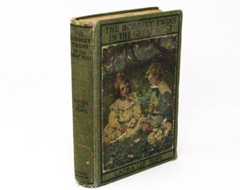 The Bobbsey Twins in the Great West by Laura Lee Hope. First Edition. Grosset & Dunlap, 1920.