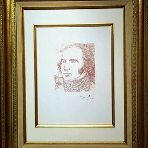 May include: A framed red and white line drawing of a man's face. The drawing is signed "J.M." in the bottom right corner.