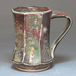 Faceted mug, porcelain with white carbon-trapping shino glaze