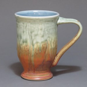 Mug with green ash and matte rust glazes