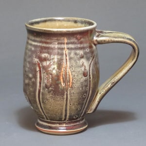 Porcelain mug with shino glaze