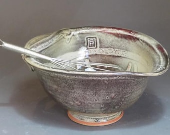 Ceramic egg bowl with whisk, white shino glaze