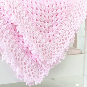 Crochet Baby Blanket Pattern Freesia #143 makes a summer crochet blanket that&#39;s light and crocheted in the round as one large granny square.