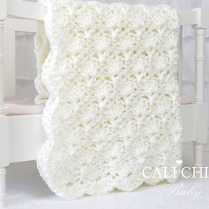 Crochet Blanket pattern Viola #33 makes a soft crochet baby blanket that works up quick with chunky weight yarn and easy edging design.