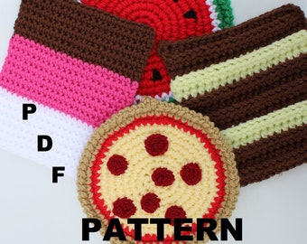 May include: Four crocheted kitchen pot holders in the shapes of a watermelon, a slice of pizza, a cake, and a chocolate bar. The pot holders are made with different colored yarn and have a textured surface.