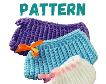 May include: Three crocheted baby booties in different colors. The largest is purple with an orange bow, the middle is light blue with an orange bow, and the smallest is white with a pink bow. The word "PATTERN" is written in teal above the booties.