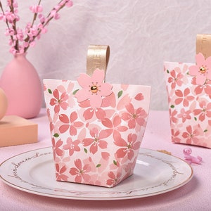 Boîtes à fleurs roses Sakura en forme de sac à main pour fête de mariage