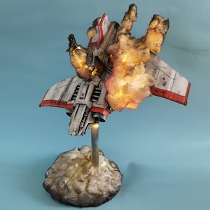 Espulsione del diorama pilota del caccia Thunderbolt imperiale.