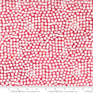 May include: Red fabric with a white polka dot pattern. The dots are slightly irregular in shape and size, creating a textured look. The fabric is perfect for quilting, sewing, and crafting.