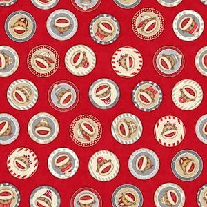 May include: Red fabric with a repeating pattern of circular designs featuring sock monkey faces. Each circle has a different design, including hats, bows, and striped borders. The overall theme is festive and playful.