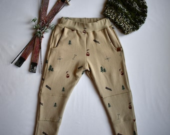 Ski Print Joggers in Organic Cotton | Knit Pants for Children, Toddlers, Babies | fin+wild | Tan with Mountain Skiing Theme