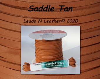 May include: A spool of Saddle Tan leather lacing, 5/16 inch wide, from Leads N Leather. The spool is labeled "Packer Direct Leather Lacing".