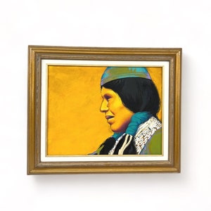 May include: A framed painting of a Native American person wearing a turquoise and purple headdress. The person is looking to the side and has dark hair. The background is a bright yellow.