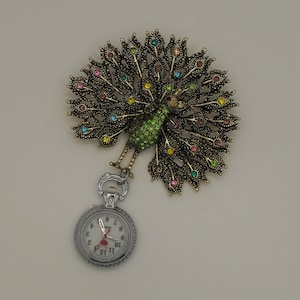 Veelkleurig kristalgoud pauwenbroche fob-horloge