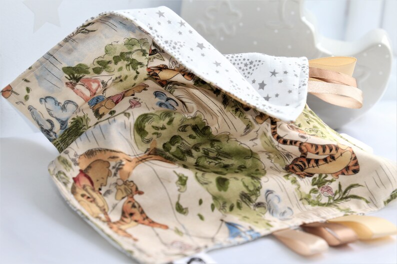 muslin taggie blanket