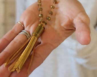 Necklace: Golden Beaded Bullet Tassel