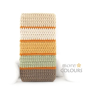 May include: A crocheted striped throw blanket in beige, white, orange, green, and brown colors.