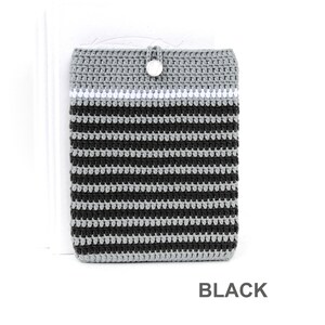Crocheted e-reader soft case made of Grey durable cotton yarn with Black stripes and White stripe above them. The e-reader cover closes with a White plastic button and a strong loop.