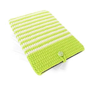 May include: A green and white striped crocheted tablet case with a small green button.