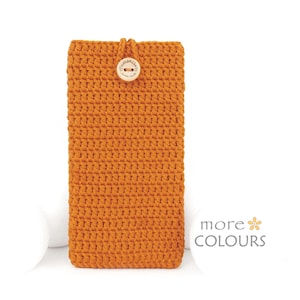 May include: Orange crocheted phone case with a wooden button. The case is made with a simple stitch pattern and has a slightly textured surface.