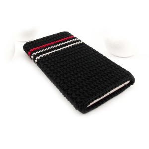 Picture shows a Black phone sock with 3 pinstripes at the bottom - 1 Red and 2 Grey. This eco-friendly phone cover case is crocheted in dense stitch of strong durable mercerized cotton yarn with a slight natural shine.