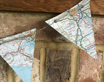 Guirnalda de mapas reciclados: Guirnalda rústica con temática de viajes