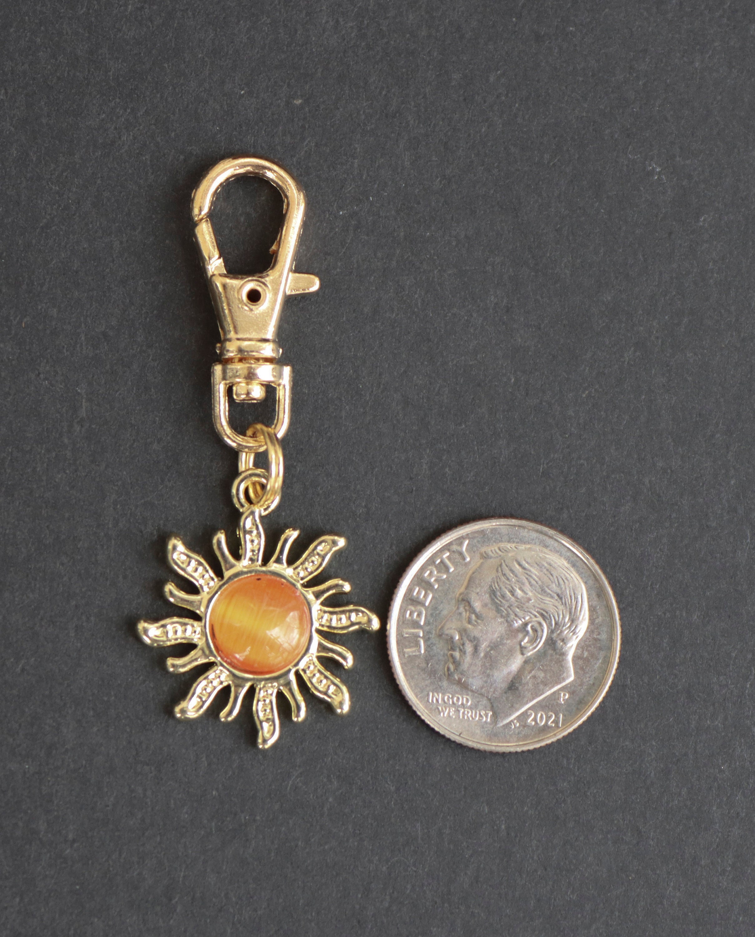 Sun-celestial-zipper Charm-gold-tone With Orange Center Sun-celestial-zipper Charm-gold-tone With Orange Center