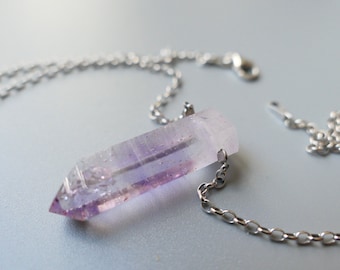 Small Amethyst crystal drilled pendant with rhodium-plated sterling silver chain gemstone untreated