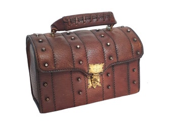 Vintage midcentury studded brown treasure chest top handle handbag.