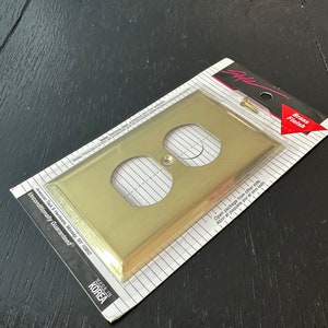 Vintage NEW in Box Old Stock Ornate Gold Metal Light Switch Socket Cover Plate Brass Sleek Mirror Outlet Style