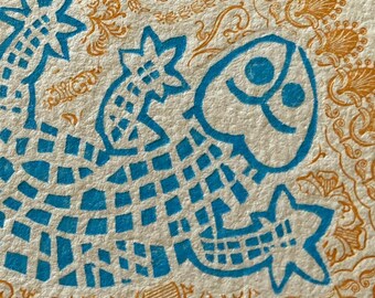look at his funny little eyes; letterpress lizard print