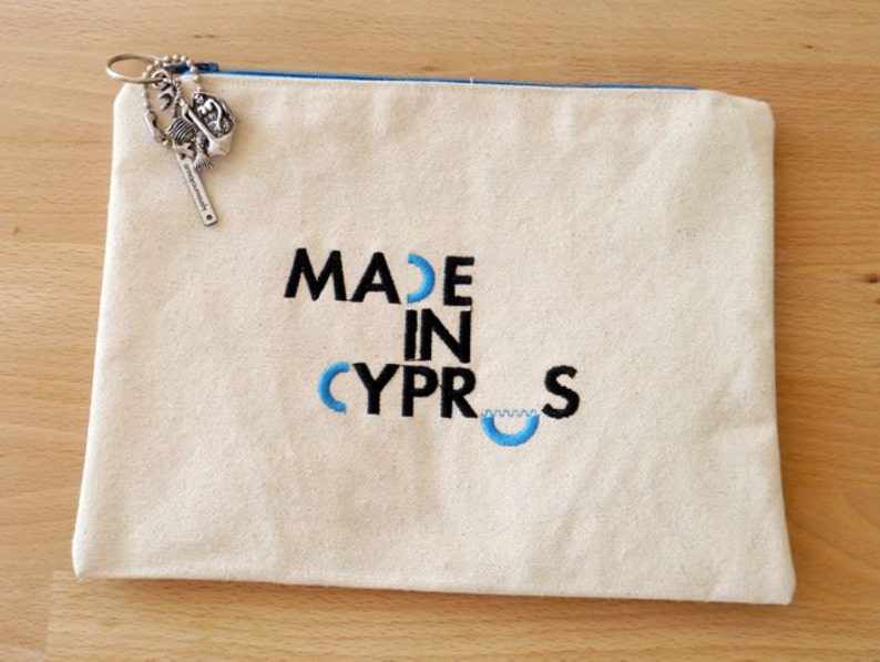 Canvas pouch with the embroidery design Made In Etsy
