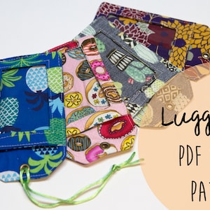 May include: A set of colourful luggage tags with clear plastic windows for name cards. The tags are made of fabric with various patterns, including pineapples, doughnuts, and floral designs. The text "Luggage Tag PDF Sewing Pattern" is written on a peach-coloured circle.