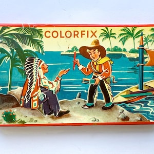 Vintage metalen blik en kleurpotloden