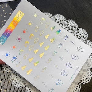 Feuille d'autocollants d'icônes météo conçue par Julia Källén