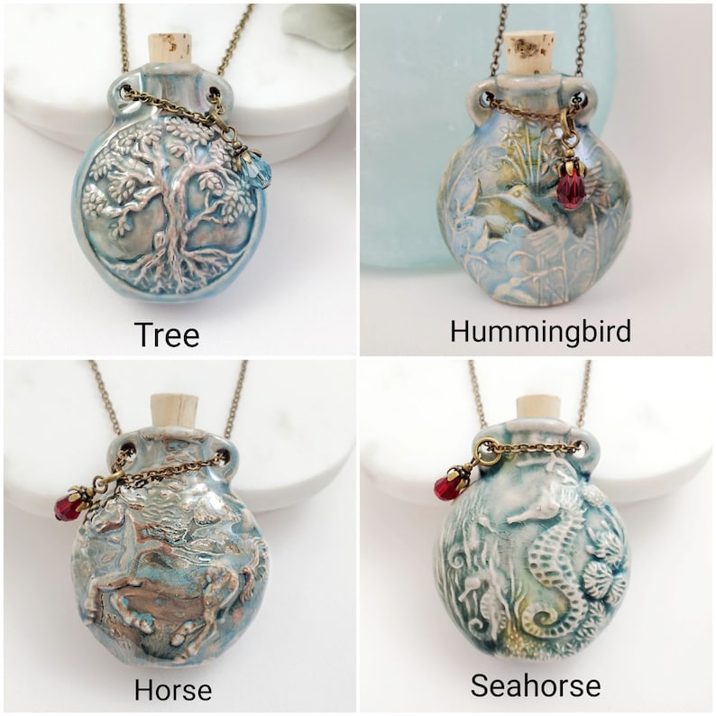 May include: Four ceramic pendant necklaces with different designs: a tree, a hummingbird, a horse, and a seahorse. Each pendant is a light blue bottle shape with a cork stopper, a bronze chain, and a decorative charm. The text labels each pendant.