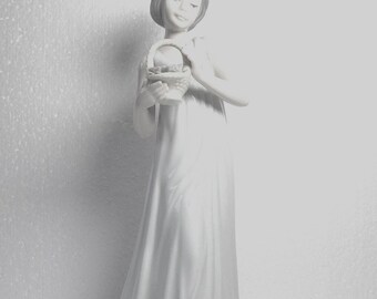 Girl holding flower basket Porcelain  Figurine By Nadal Studio Valencia