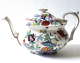 Tetera antigua Booths de 1908 con diseño pompadour.