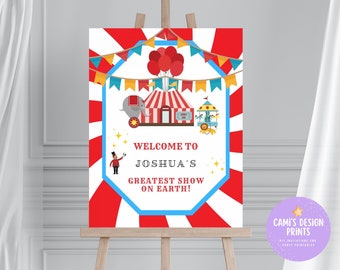 May include: A red and white circus themed welcome sign with a blue border. The sign features a red and white striped tent, a carousel, an elephant, and a ringmaster. The text on the sign reads "Welcome to Joshua's Greatest Show on Earth!"