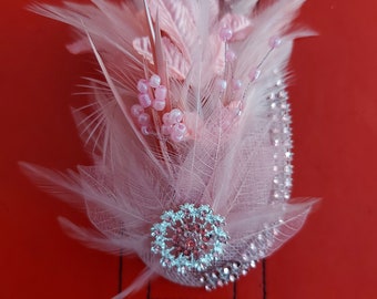 Pale pink fascinator