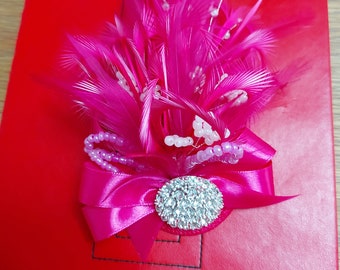 Bright pink fascinator