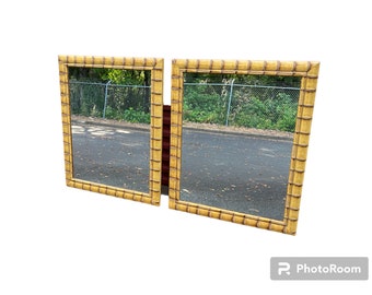 A pair of vintage faux bamboo mirrors