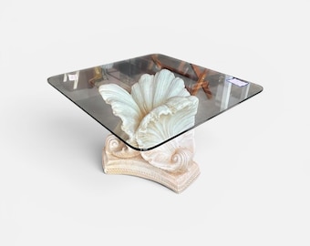 Vintage triple shell base coffee table with glass top