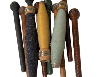 A collection of primitive bobbins