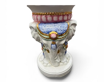 A pair of vintage elephant garden stools / plant stands