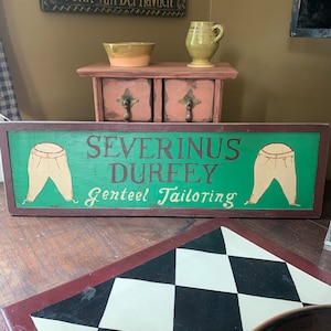Primitive, colonial Early american trade sign