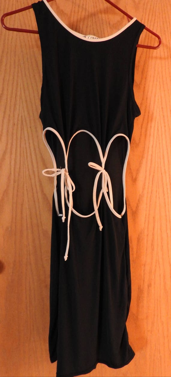 black dress with hole in the middle