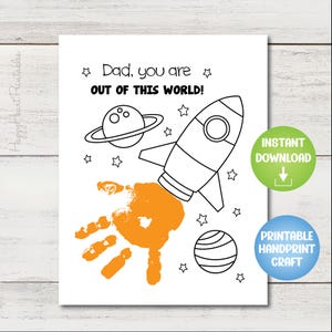 May include: A white printable card with a rocket ship, planets, and stars. The text reads "Dad, you are OUT OF THIS WORLD!" An orange handprint is part of the design. Includes "Instant Download" and "Printable Handprint Craft" labels.