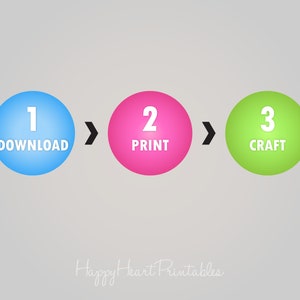 May include: A graphic with a light gray background shows a three-step process. The steps are represented by blue, pink, and green circles with the numbers 1, 2, and 3 inside. The words "DOWNLOAD", "PRINT", and "CRAFT" are written below the numbers. The text "Happy Heart Printables" is at the bottom.
