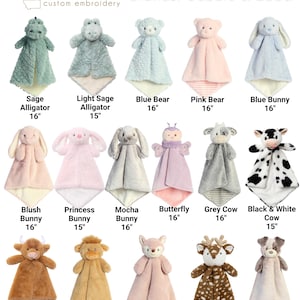 May include: A collection of 15-inch and 16-inch loveys by Cubbie and Ebba, featuring various plush animal designs including alligators, bears, bunnies, a butterfly, cows, deer, and a dog, with text labels for each item and the 406 Baby brand.